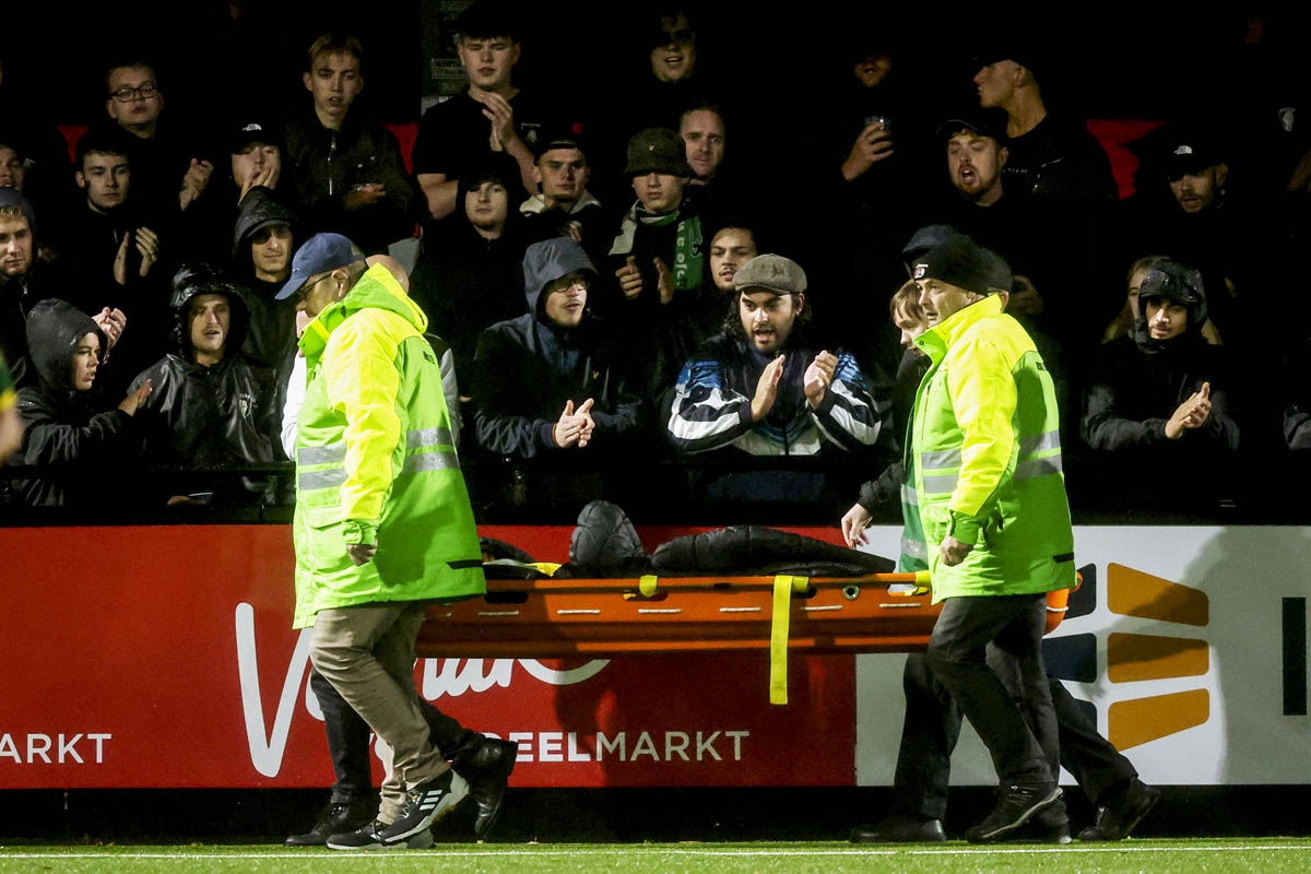 *Illaijh de Ruijter* of ADO Den Haag leaving the pitch on a stretcher after getting injured