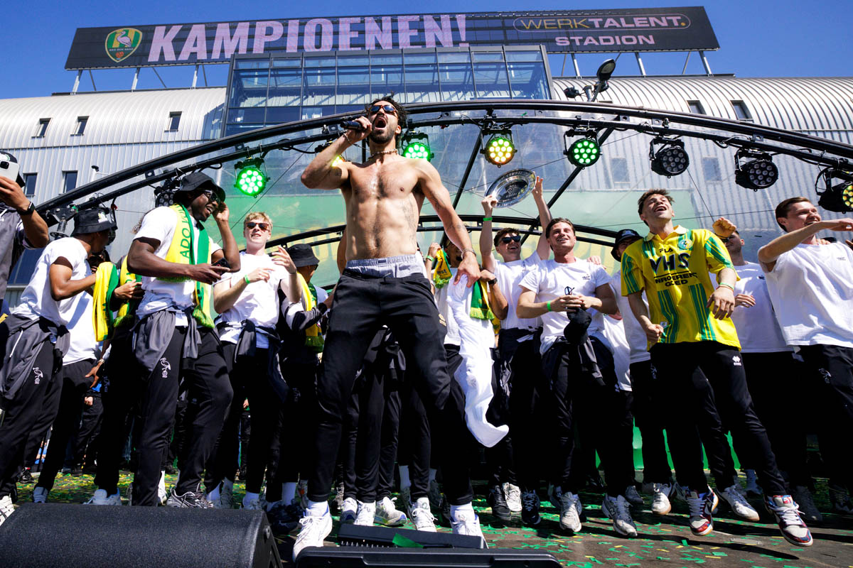 (L-R) *Steven van der Sloot* of ADO Den Haag, *Jesse Bal* of ADO Den Haag, *Cameron Peupion* of ADO Den Haag, *Kilian Nikiema* of ADO Den Haag, *Diogo Tomas* of ADO Den Haag, *Finn de Bruin* of ADO Den Haag, *Milan Hokke* of ADO Den Haag  celebrating promotion to the eredivisie 